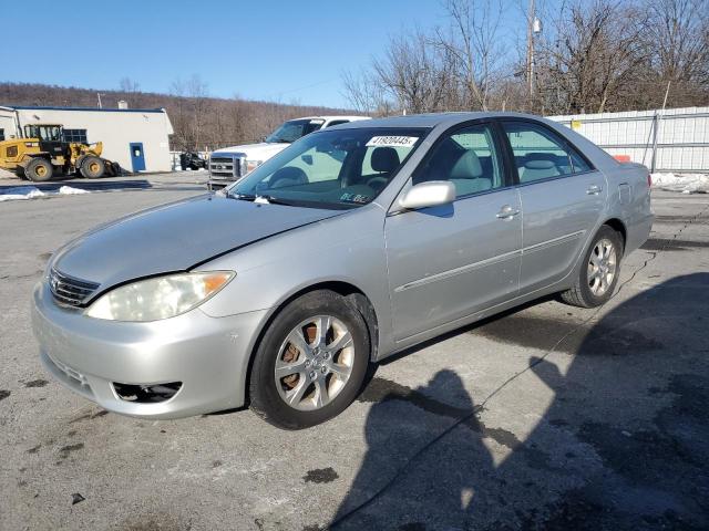 TOYOTA CAMRY LE 2005 with VIN 4T1BF30K05U605559 - Photo from auction