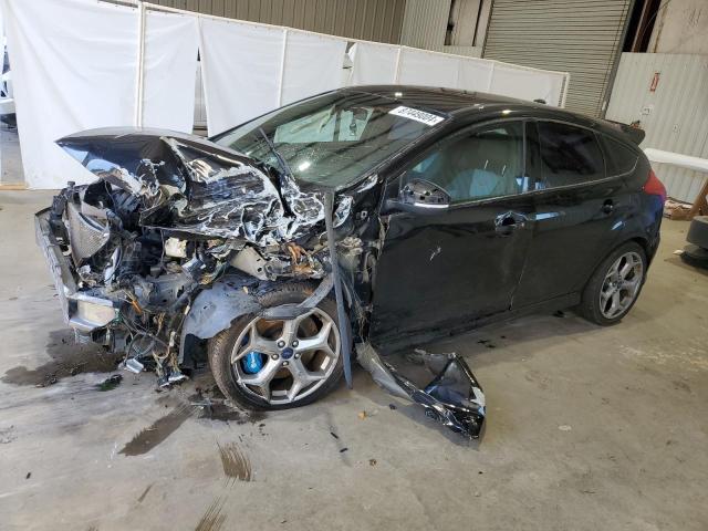 FORD FOCUS ST 2017 with VIN 1FADP3L94HL317451 - Photo from auction