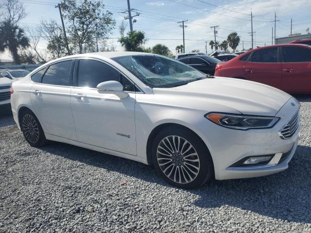 Photo 4 from auction – 2018 FORD FUSION TIT with VIN 3FA6P0RU2JR141204