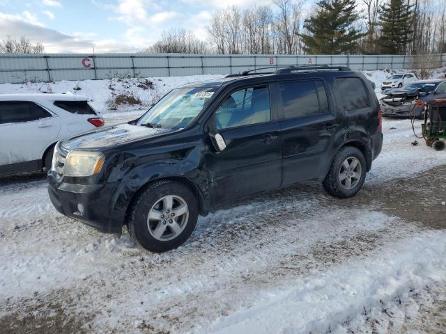 HONDA PILOT EXL 2011 with VIN 5FNYF4H55BB068954 - Photo from auction