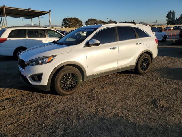 KIA SORENTO LX 2016 with VIN 5XYPG4A50GG095000 - Photo from auction