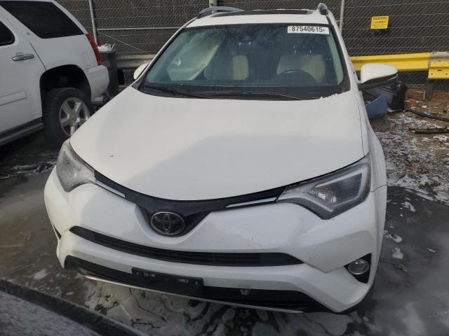 Photo 5 from auction – 2017 TOYOTA RAV4 XLE with VIN JTMRFREV7HJ123170