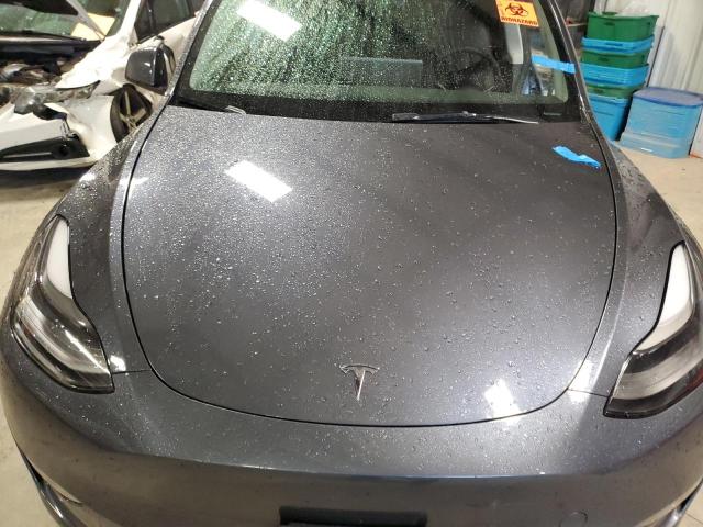 Photo 12 from auction – 2023 TESLA MODEL Y with VIN 7SAYGDEE2PF765784