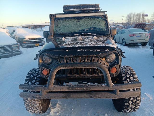 Photo 5 from auction – 2011 JEEP WRANGLER U with VIN 1J4BA3H14BL625467