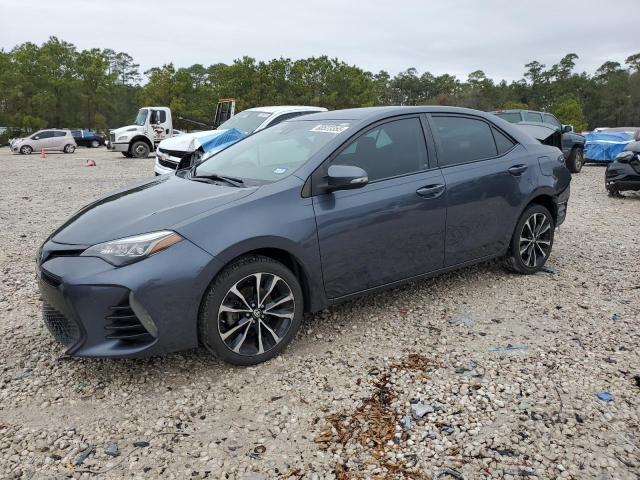 TOYOTA COROLLA L 2018 with VIN 5YFBURHE6JP740225 - Photo from auction