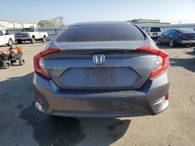 Photo 6 from auction – 2017 HONDA CIVIC LX with VIN 2HGFC2F5XHH509988