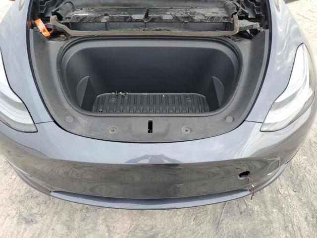 Photo 12 from auction – 2023 TESLA MODEL Y with VIN 7SAYGDEE3PA165000