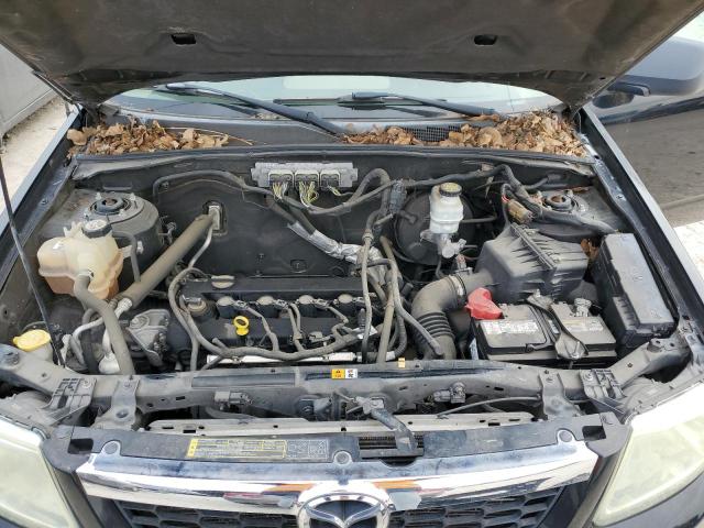 Photo 12 from auction – 2009 MAZDA TRIBUTE I with VIN 4F2CZ02739KM03047
