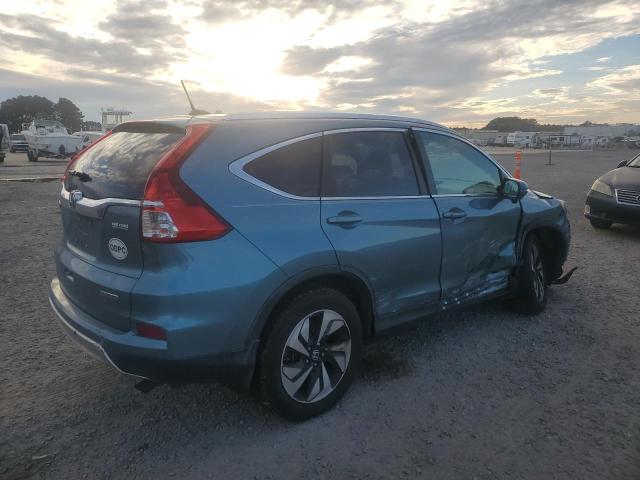 Photo 3 from auction – 2015 HONDA CR-V TOURI with VIN 5J6RM3H97FL025141