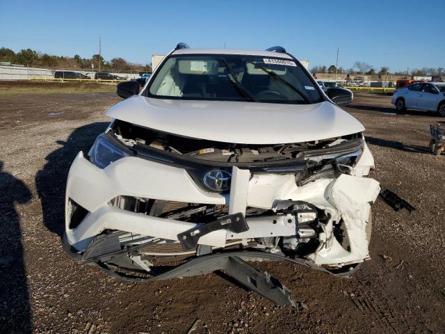 Photo 5 from auction – 2017 TOYOTA RAV4 LE with VIN JTMZFREV6HJ124682