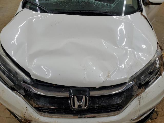 Photo 12 from auction – 2015 HONDA CR-V EXL with VIN 5J6RM4H77FL002110