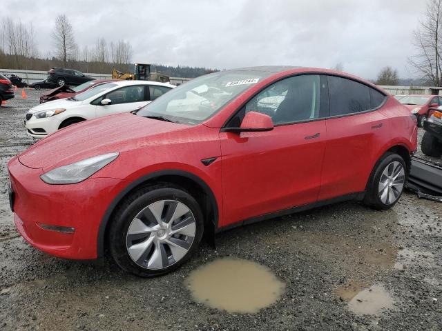 TESLA MODEL Y 2023 with VIN 7SAYGDEE9PF860875 - Photo from auction