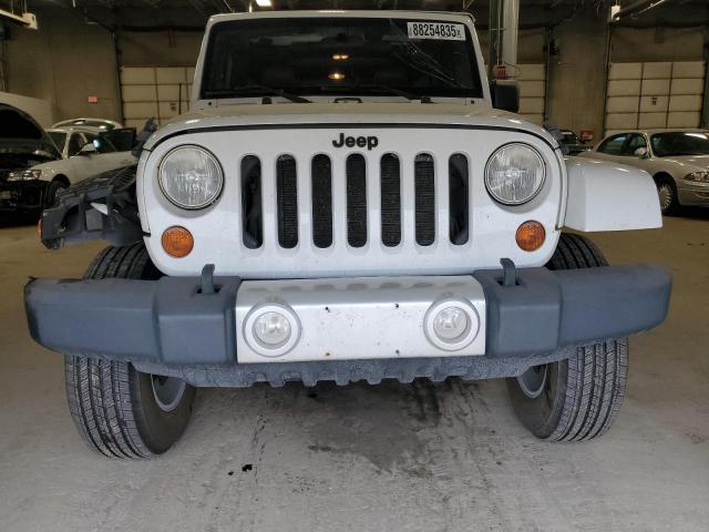 Photo 5 from auction – 2011 JEEP WRANGLER U with VIN 1J4BA5H19BL617649