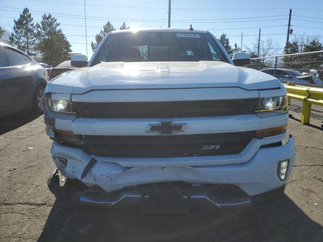 Photo 5 from auction – 2018 CHEVROLET SILVERADO with VIN 3GCUKREC5JG553243