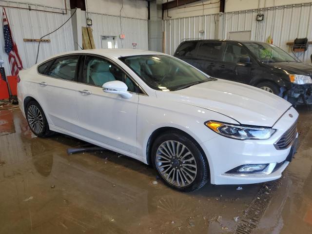 Photo 4 from auction – 2017 FORD FUSION TIT with VIN 3FA6P0K90HR131559