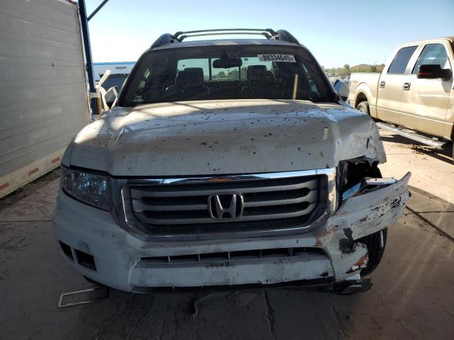 Photo 5 from auction – 2014 HONDA RIDGELINE with VIN 5FPYK1F51EB011627