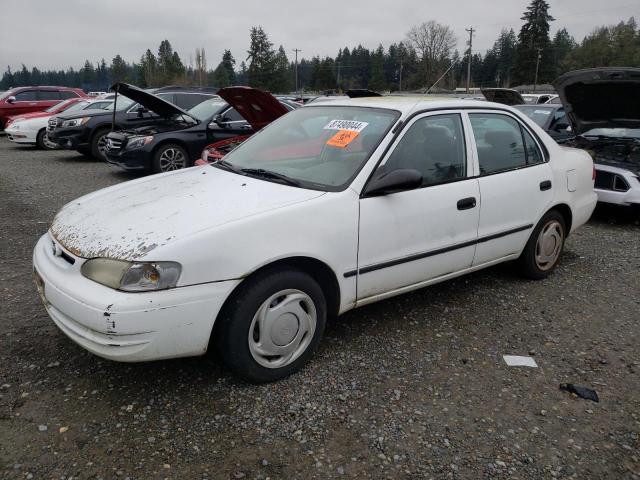TOYOTA COROLLA VE 2000 with VIN 1NXBR12E7YZ373968 - Photo from auction