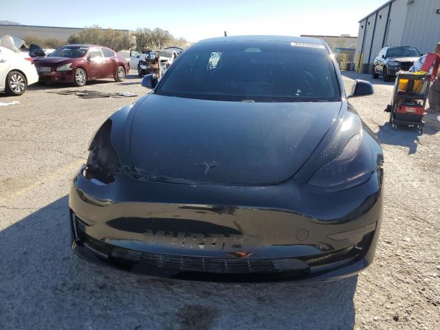 Photo 5 from auction – 2021 TESLA MODEL 3 with VIN 5YJ3E1EBXMF876712
