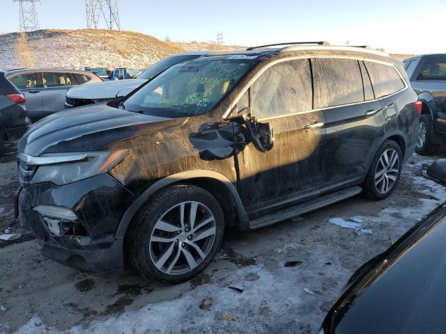 HONDA PILOT ELIT 2016 with VIN 5FNYF6H03GB070029 - Photo from auction