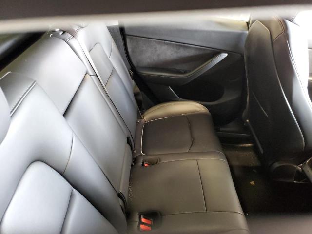Photo 11 from auction – 2023 TESLA MODEL Y with VIN 7SAYGDEE6PF691477