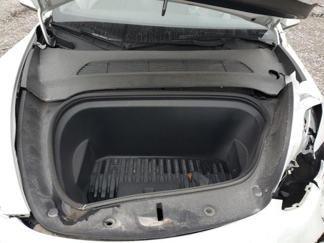 Photo 11 from auction – 2023 TESLA MODEL Y with VIN 7SAYGDEE2PA083128