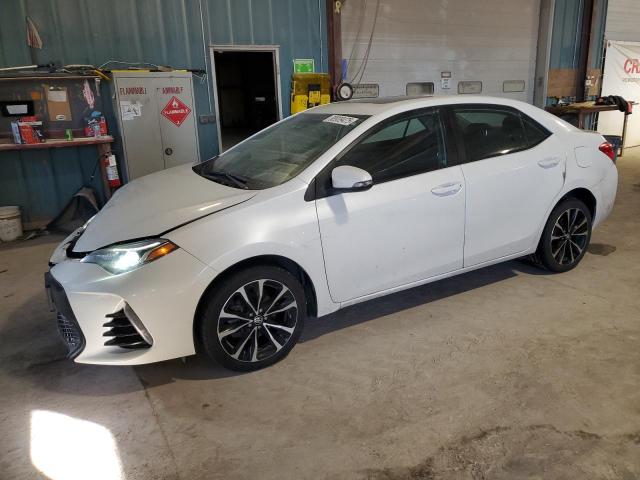 TOYOTA COROLLA L 2018 with VIN 5YFBURHE6JP754898 - Photo from auction
