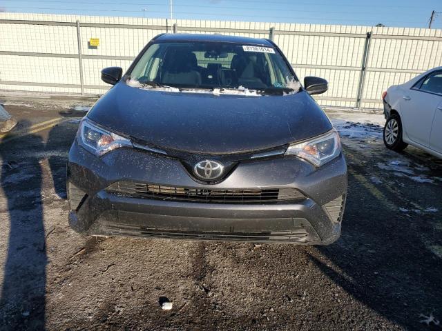 Photo 5 from auction – 2017 TOYOTA RAV4 LE with VIN JTMBFREV1HJ165836