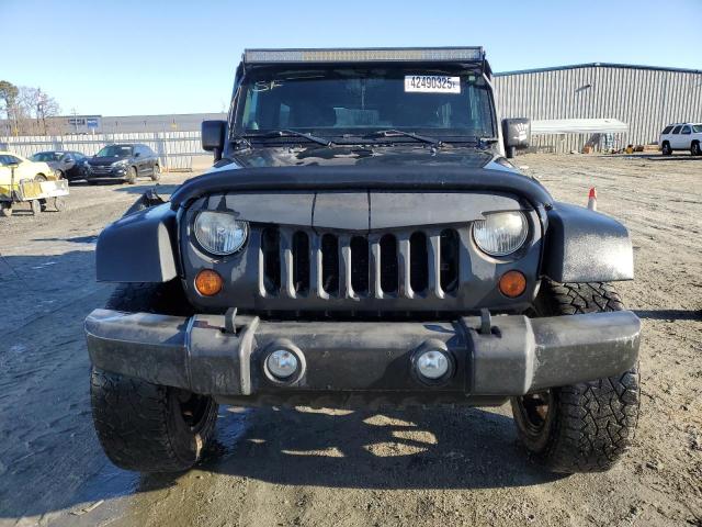 Photo 5 from auction – 2012 JEEP WRANGLER U with VIN 1C4BJWDG5CL254726