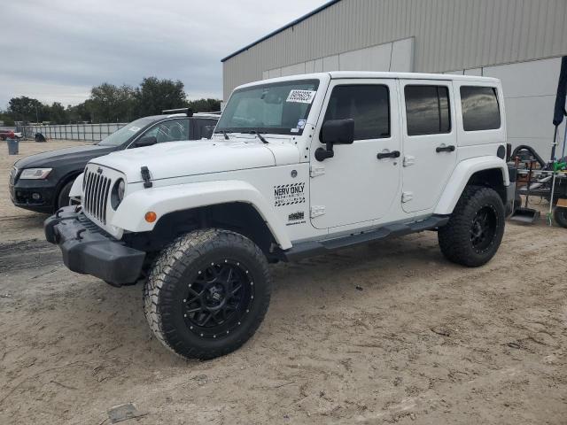 JEEP WRANGLER U 2014 with VIN 1C4BJWEG3EL196729 - Photo from auction