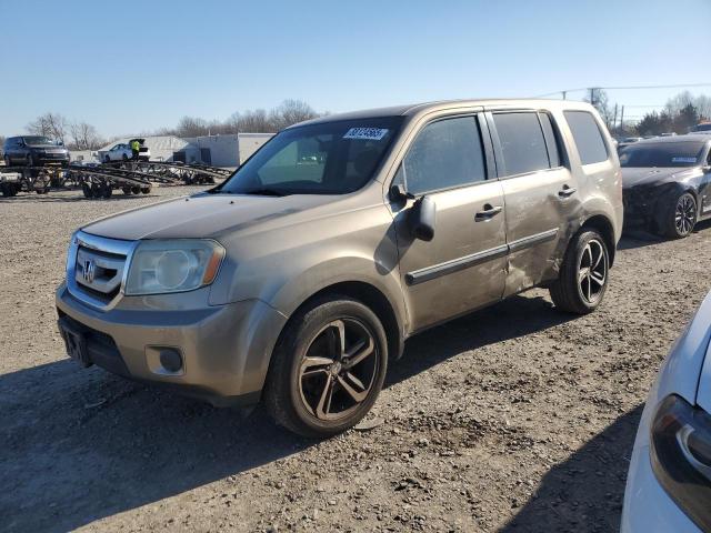 HONDA PILOT LX 2011 with VIN 5FNYF4H22BB023718 - Photo from auction