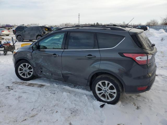 Photo 2 from auction – 2018 FORD ESCAPE SE with VIN 1FMCU0GD0JUD23948