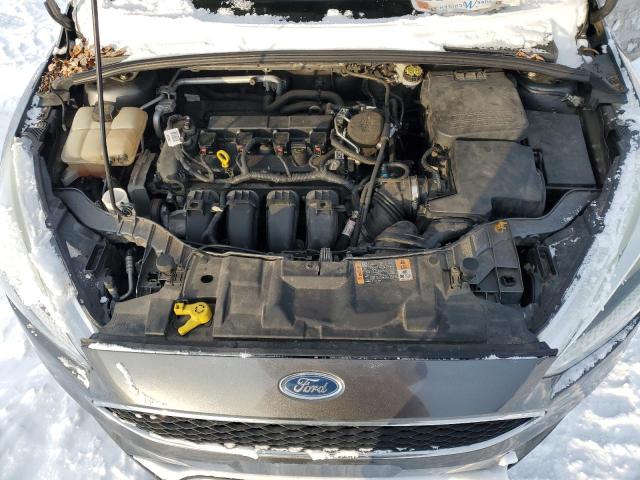 Photo 11 from auction – 2015 FORD FOCUS SE with VIN 1FADP3F20FL208643
