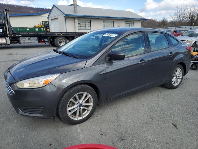 FORD FOCUS SE 2018 with VIN 1FADP3F27JL208566 - Photo from auction