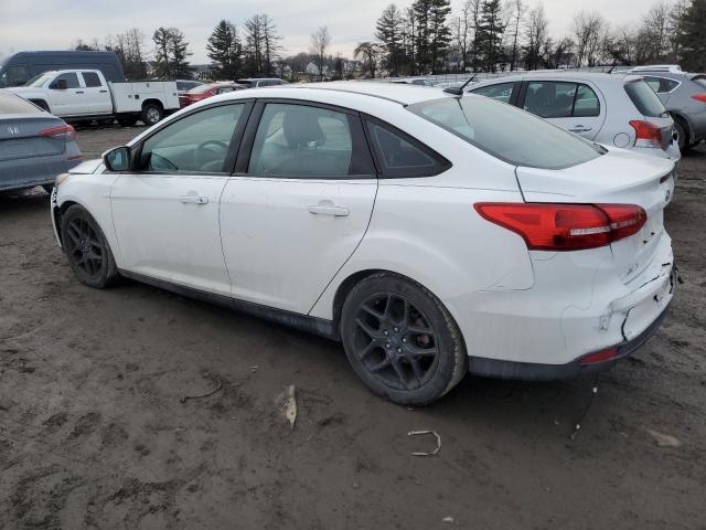 Снимка 2 от търг – 2016 FORD FOCUS SE с VIN 1FADP3F22GL342636
