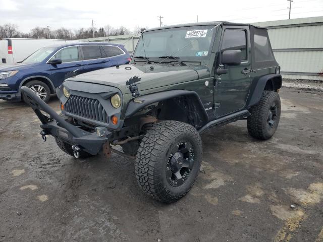 JEEP WRANGLER S 2010 with VIN 1J4AA2D17AL230807 - Photo from auction