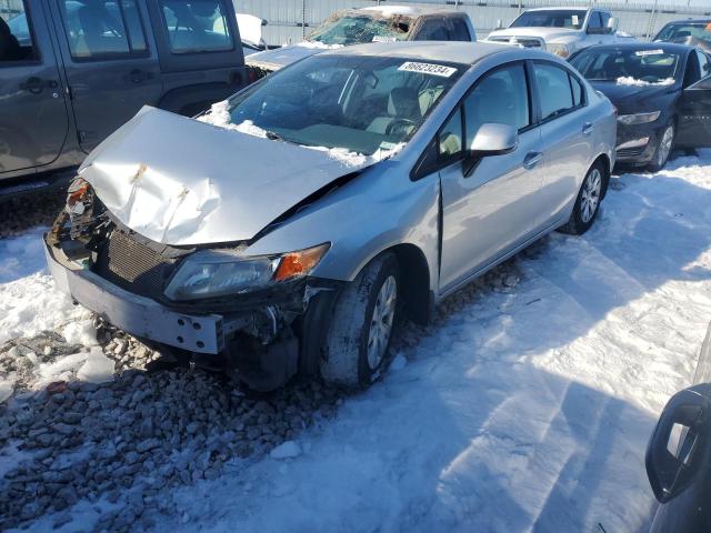 HONDA CIVIC LX 2012 with VIN 2HGFB2F55CH304736 - Photo from auction
