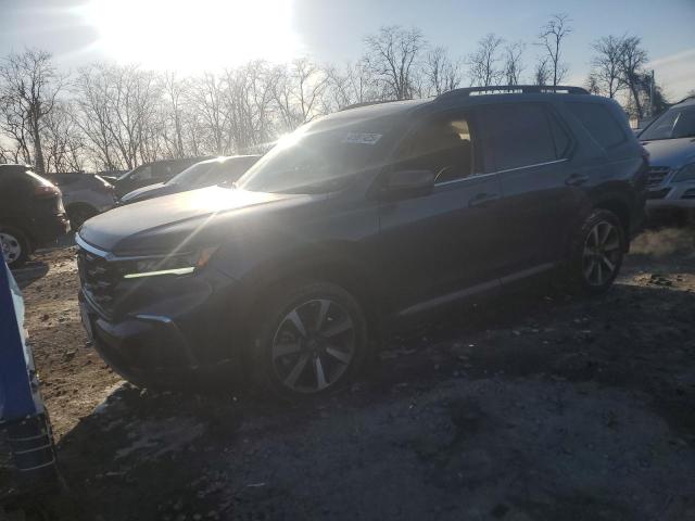 HONDA PILOT ELIT 2023 with VIN 5FNYG1H88PB003013 - Photo from auction