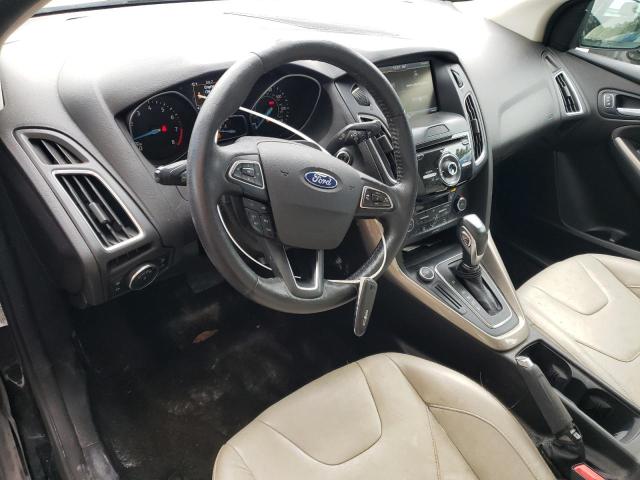 Photo 8 from auction – 2015 FORD FOCUS TITA with VIN 1FADP3J22FL259682