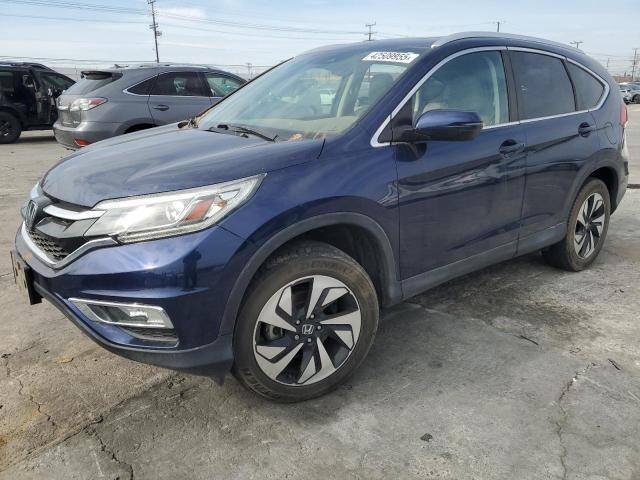 HONDA CR-V TOURI 2015 with VIN 5J6RM3H93FL018140 - Photo from auction