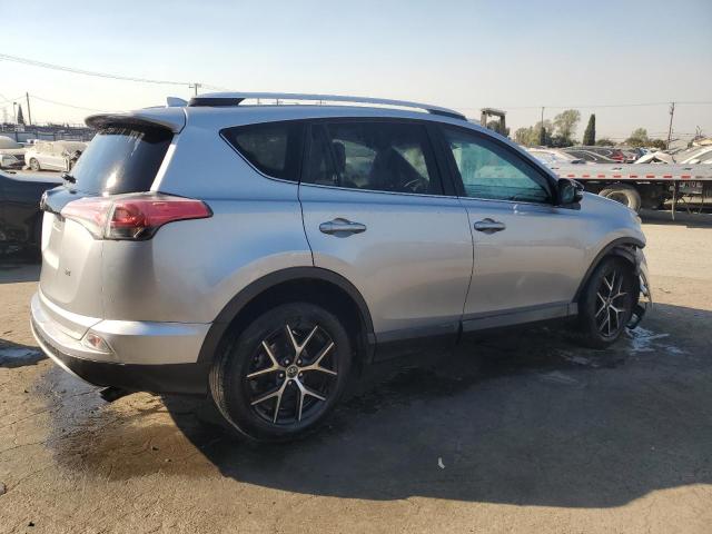 Photo 3 from auction – 2016 TOYOTA RAV4 SE with VIN 2T3NFREV1GW277680