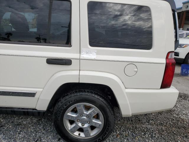 Photo 13 from auction – 2006 JEEP COMMANDER with VIN 1J8HH48K36C204932
