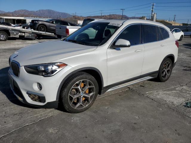BMW X1 XDRIVE2 2019 with VIN WBXHT3C58K5L36880 - Photo from auction