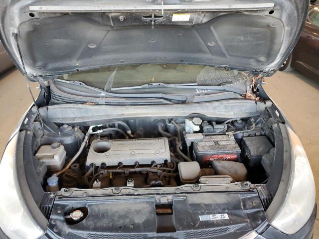 Photo 12 from auction – 2012 HYUNDAI TUCSON GLS with VIN KM8JUCAC7CU350754