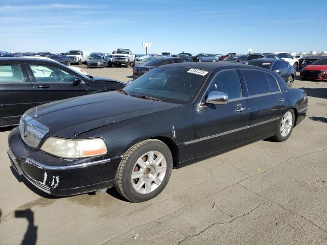 LINCOLN TOWN CAR E 2011 with VIN 2LNBL8EV1BX757170 - Photo from auction