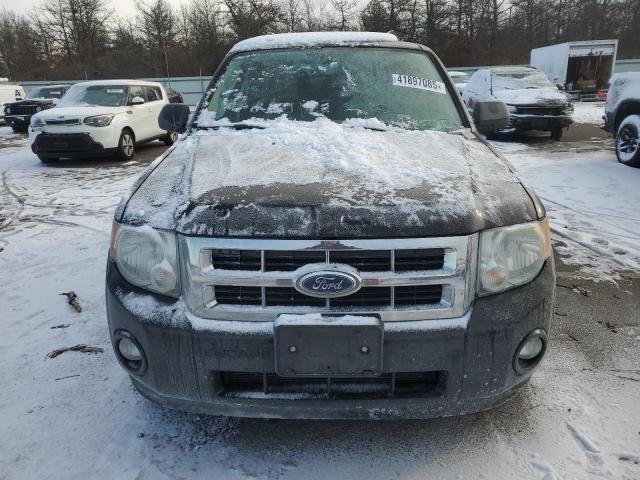 Photo 5 from auction – 2011 FORD ESCAPE with VIN 1FMCU0DG6BKC27527