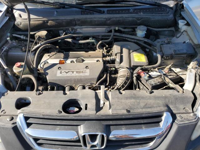 Photo 12 from auction – 2004 HONDA CR-V LX with VIN JHLRD68404C008290