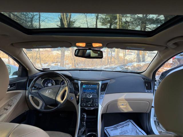 Photo 9 from auction – 2012 HYUNDAI SONATA SE with VIN 5NPEC4AC4CH459052