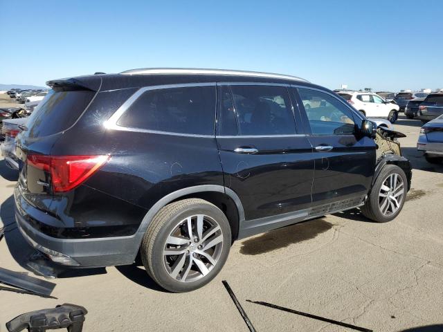 Photo 3 from auction – 2017 HONDA PILOT TOUR with VIN 5FNYF5H95HB010845