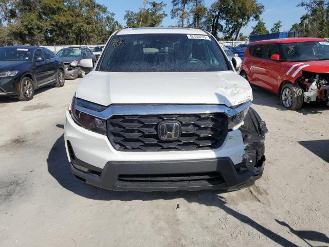 Photo 5 from auction – 2022 HONDA PASSPORT E with VIN 5FNYF7H51NB003217