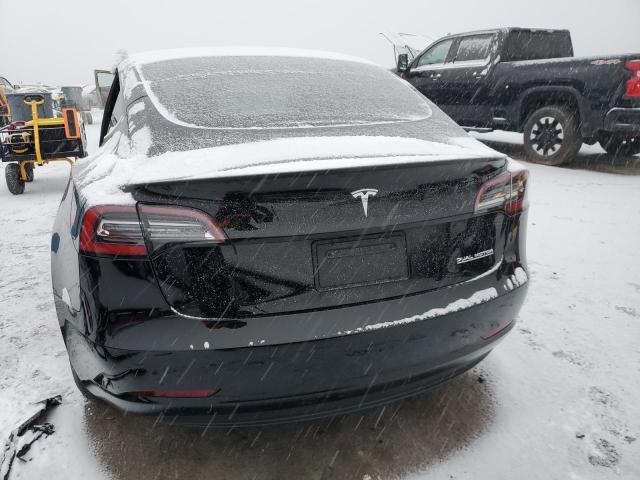 Photo 6 from auction – 2022 TESLA MODEL 3 with VIN 5YJ3E1EC1NF329953